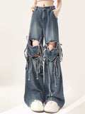 High-Waisted Straps For A Loose Fit Ripped Jeans