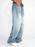 Blaue gerade Jeans mit weitem Bein