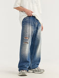 Zerrissene Retro-Jeans mit weitem Bein