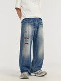 Zerrissene Retro-Jeans mit weitem Bein