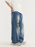 Zerrissene Retro-Jeans mit weitem Bein