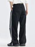 High Street Hole-In-The-Wall-Schlichtheit, lockere Jeans