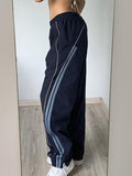 Pantalon de survêtement large avec passepoil