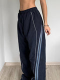 Pantalon de survêtement large avec passepoil