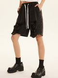 Shorts mit Distressed-Print