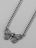 Collier chaîne avec pendentif tête de mort papillon pour hommes