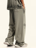 Pantalon large uni effet vieilli pour hommes