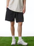 Short de sport de loisirs en plein air uni pour hommes