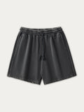 Short ample uni délavé et vieilli pour homme