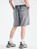 Short ample simple délavé pour hommes