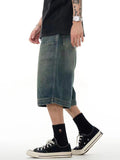 Lockere, weit geschnittene Shorts aus gewaschenem Distressed-Denim für Herren